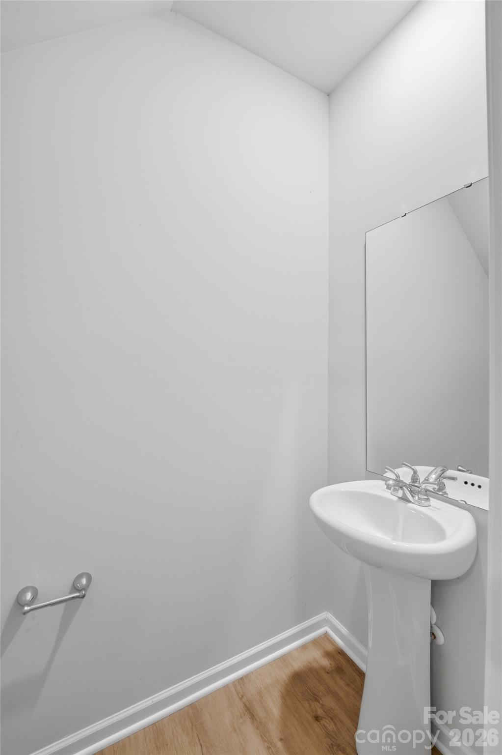 242 Landers Chapel Road Lincolnton, NC 28092 - Photo 9 of 33 a bathroom with a sink and mirror