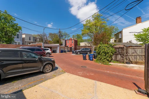 a view of a cars park in front of house