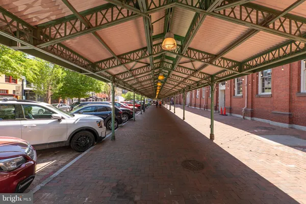 a view of cars parked on the street