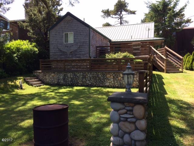 47840 Hawk Street Neskowin, OR 97149 - Photo 2 of 20 Exterior with River Rock Details