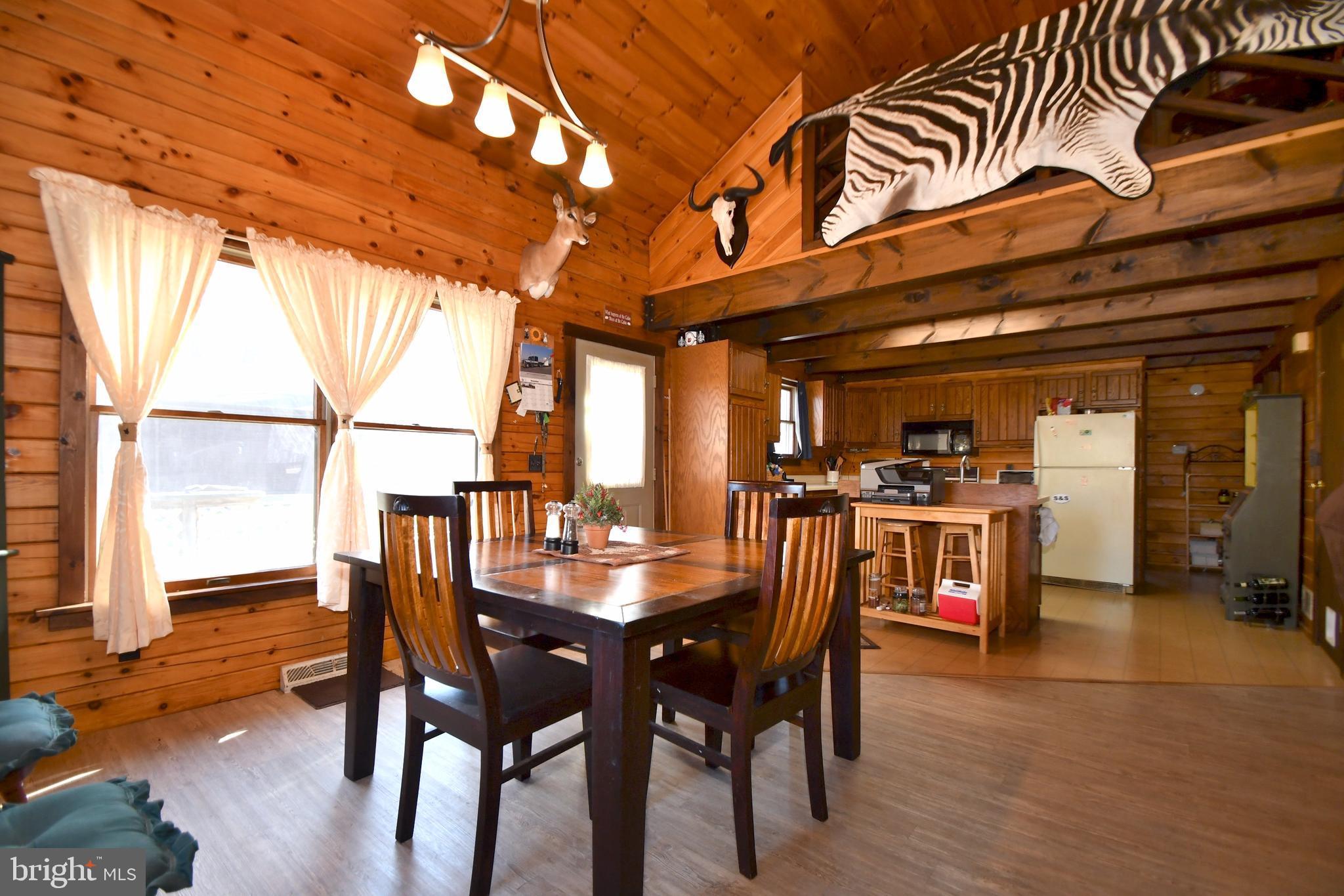175 Newcomer Road Windsor, PA 17366 - Photo 13 of 30 Dining Room looking into Kit with Loft above