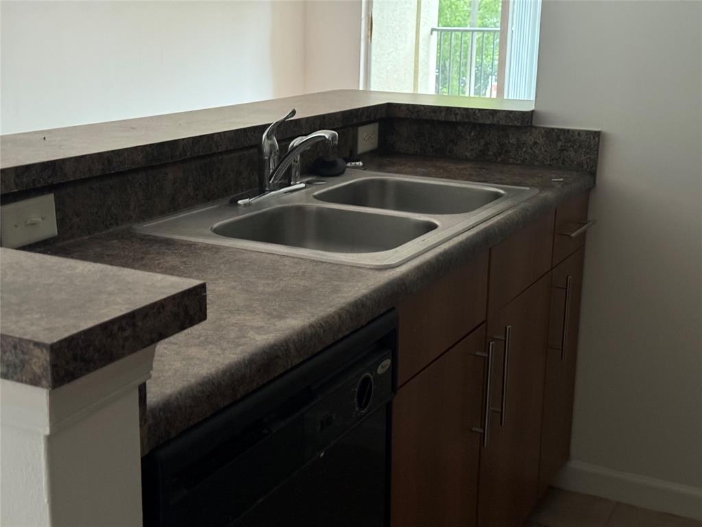 5800 West Sample Road, Unit 2011 Coral Springs, FL 33067 - Photo 18 of 25 a close view of sink and tap