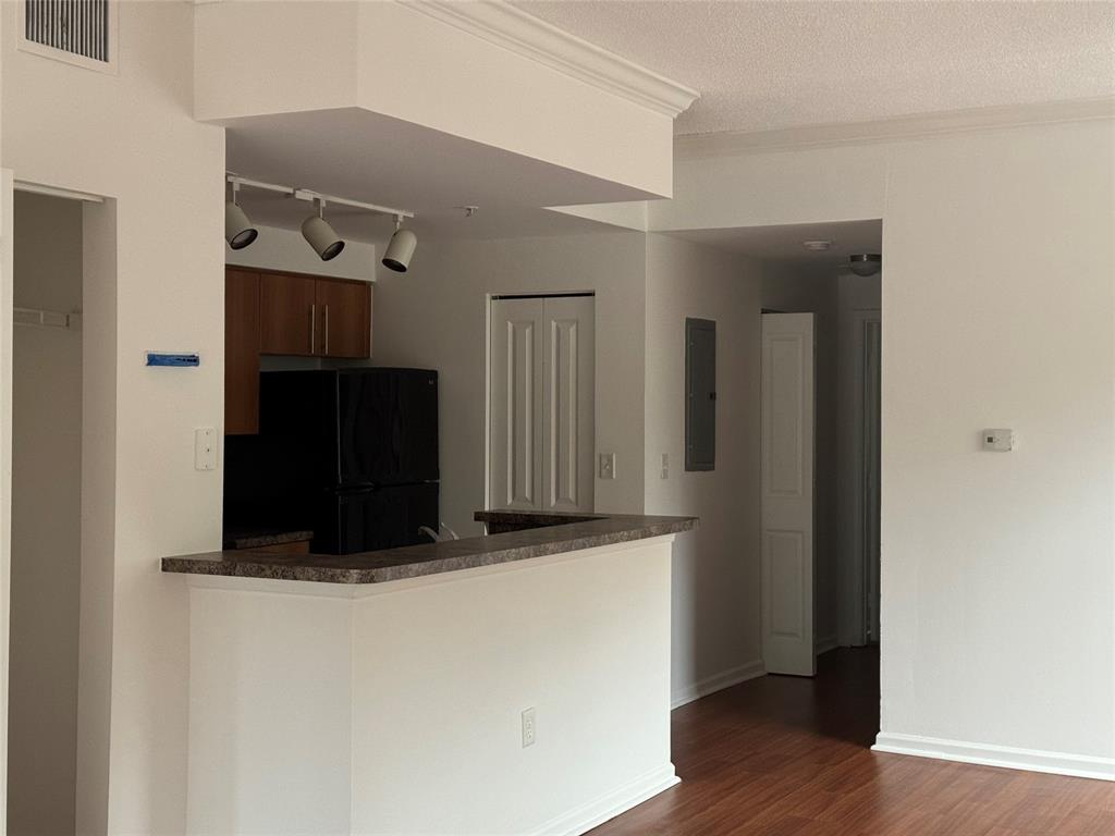 5800 West Sample Road, Unit 2011 Coral Springs, FL 33067 - Photo 10 of 25 a view of hallway with wooden floor