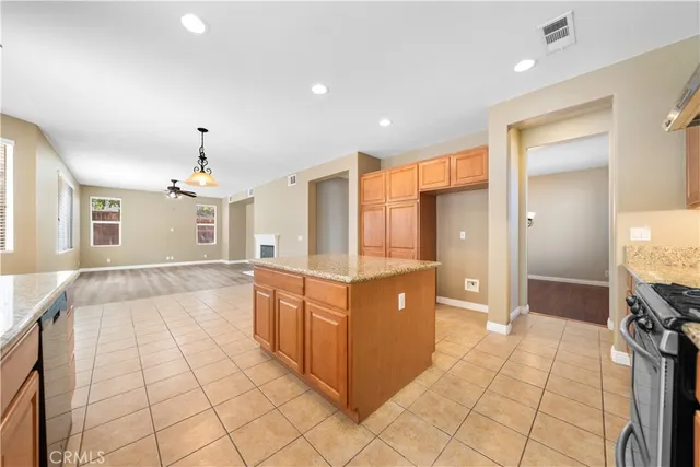 a spacious bathroom with a mirror and a shower
