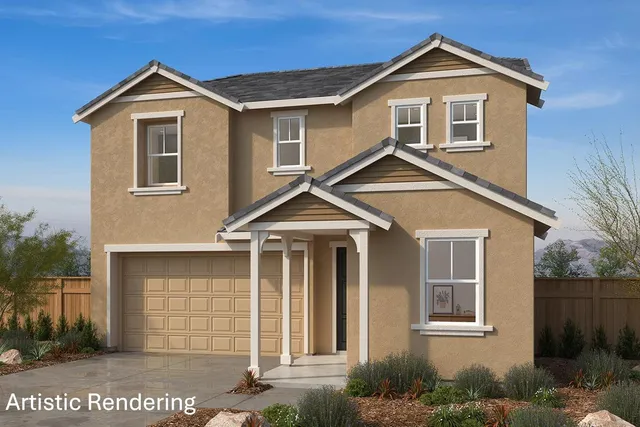 a front view of a house with garage