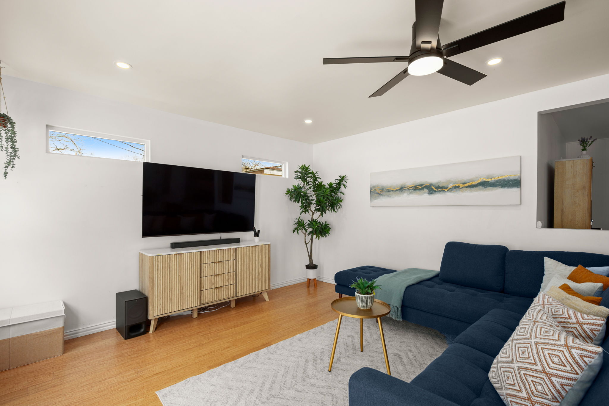 6304 Peggy Street Austin, TX 78723 - Photo 14 of 35 Living room with wood finished floors, ceiling fan, and recessed lighting