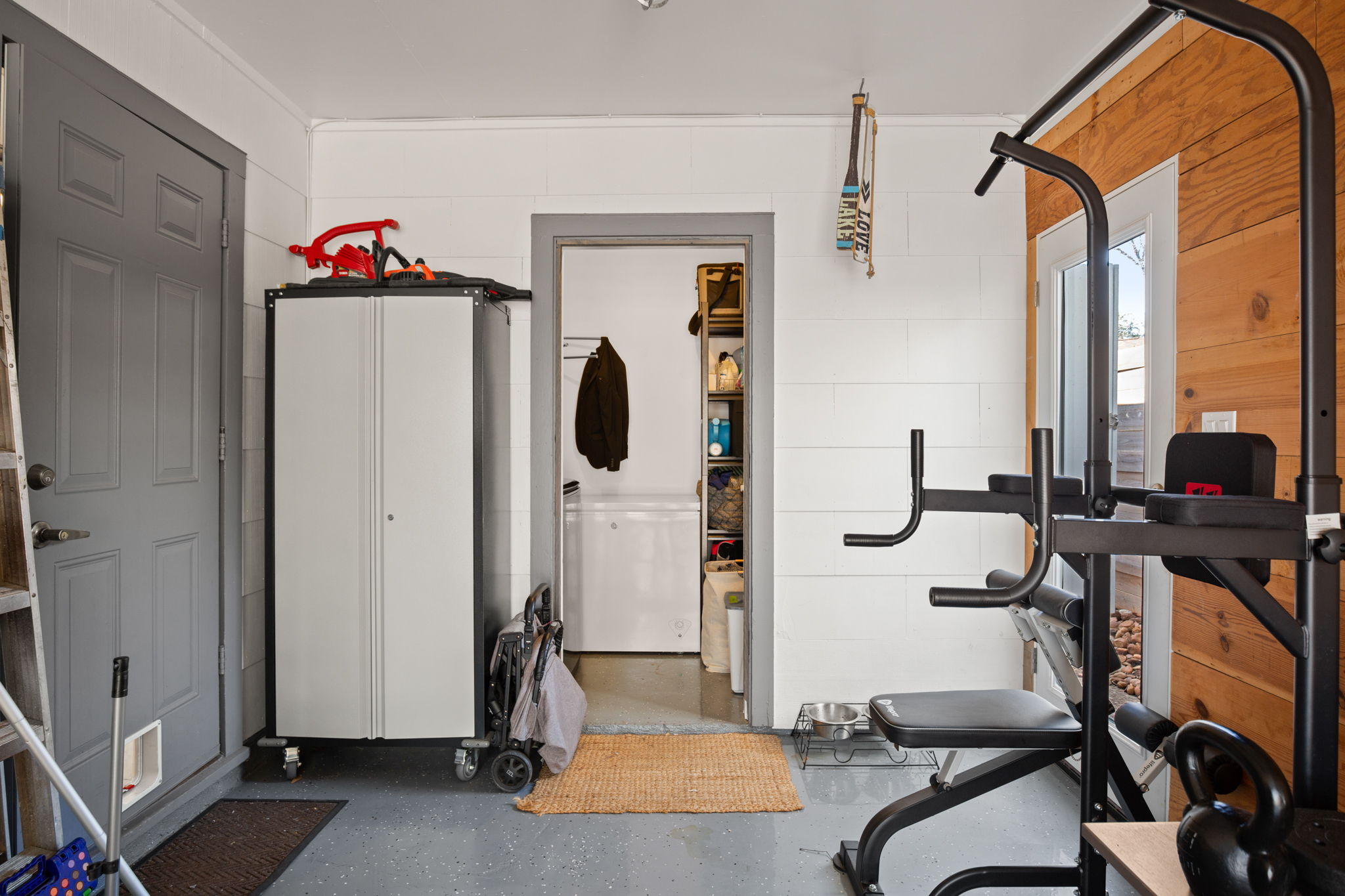 6304 Peggy Street Austin, TX 78723 - Photo 32 of 35 Workout room featuring finished concrete flooring