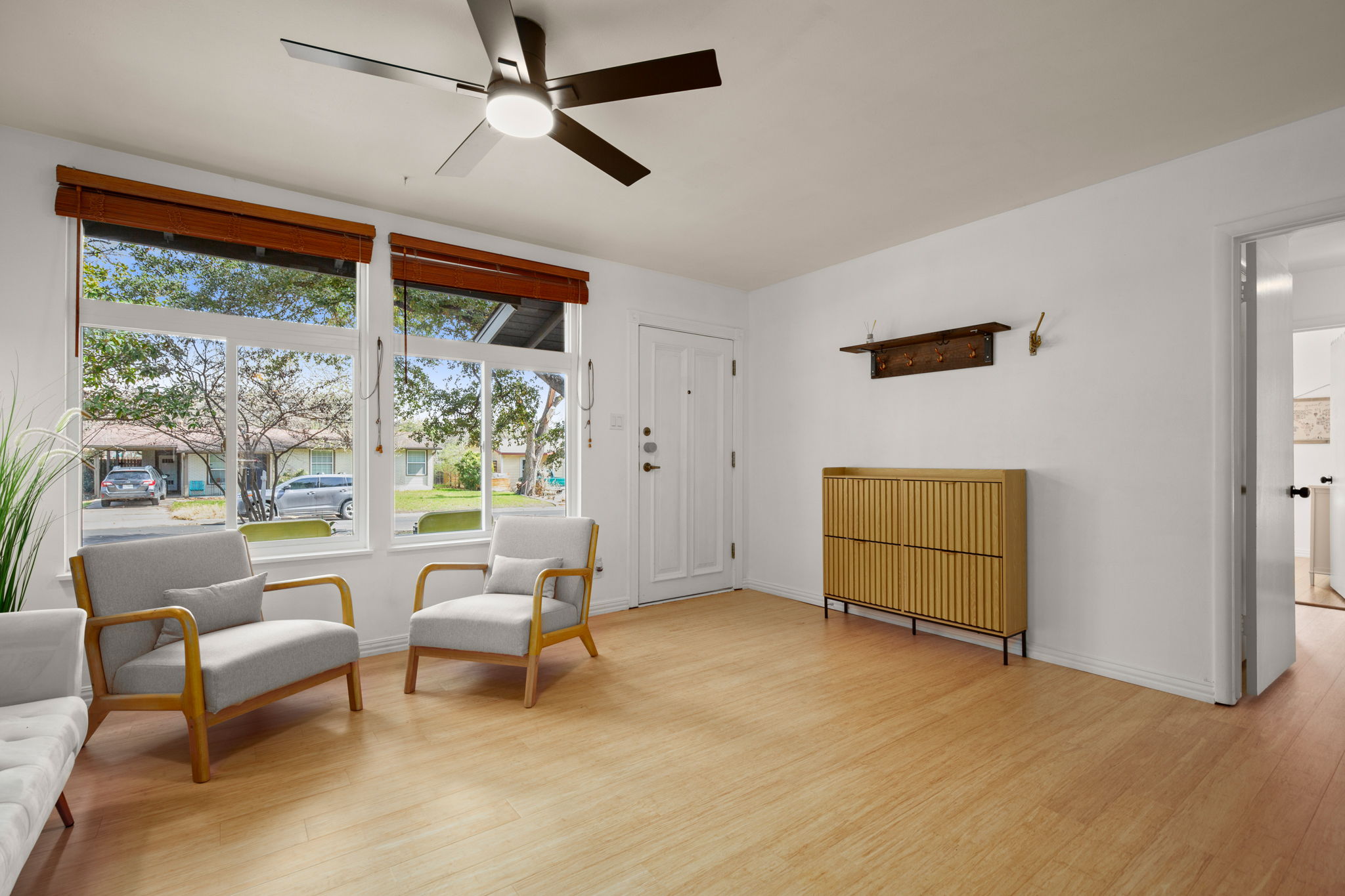 6304 Peggy Street Austin, TX 78723 - Photo 4 of 35 Sitting room featuring light wood-style floors and a ceiling fan