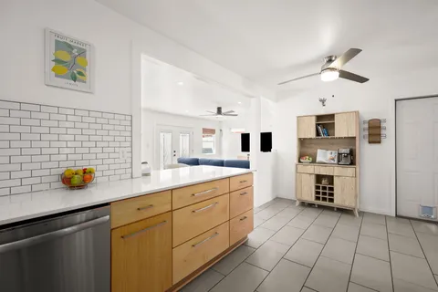 a kitchen with a cabinets and appliances