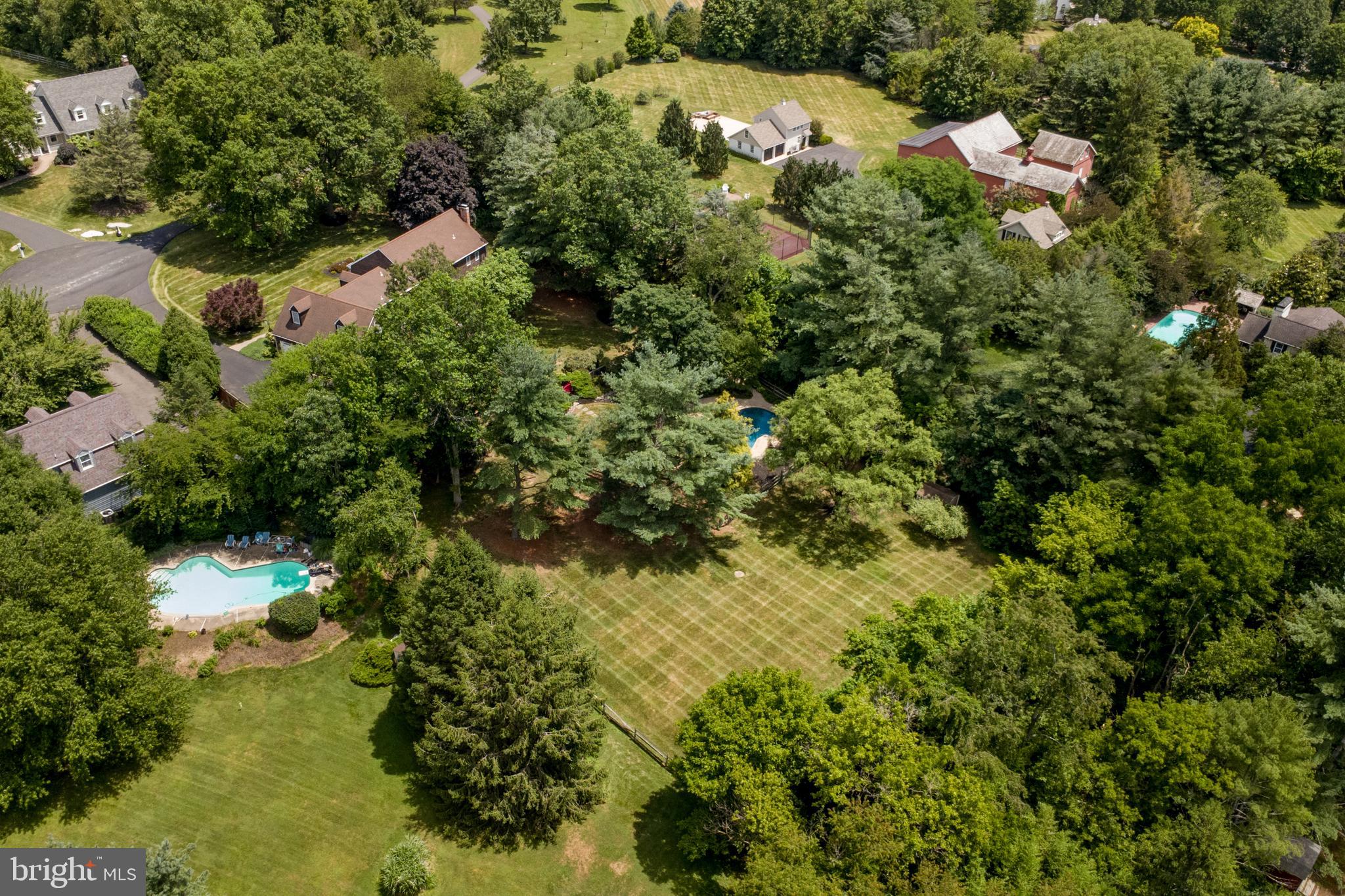 950 Camelot Road Furlong, PA 18925 - Photo 98 of 106 an aerial view of residential house with yard and outdoor seating