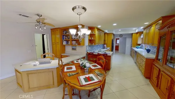 a very nice looking dining room with a large window