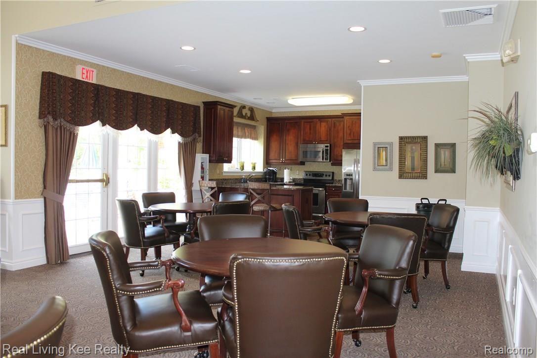 3393 Tremonte Circle, Unit 204 Rochester, MI 48306 - Photo 38 of 40 36 club house kitchen.jpg