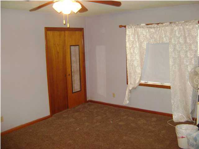 545 Richardson Road DeFuniak Springs, FL 32433 - Photo 12 of 22 a view of an empty room with a window