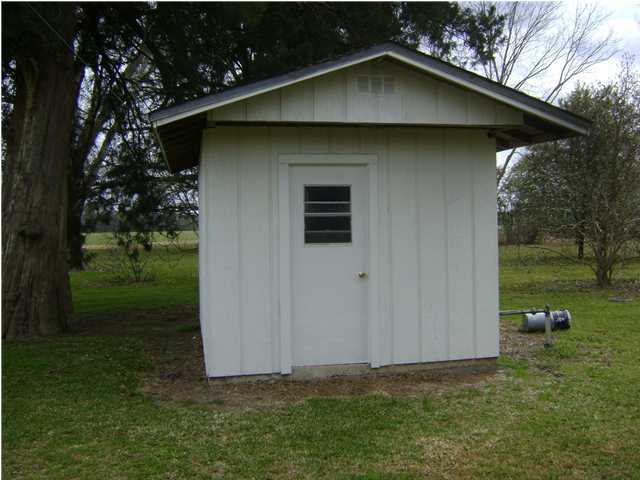 545 Richardson Road DeFuniak Springs, FL 32433 - Photo 15 of 22 a house with garden in front of it