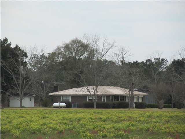 545 Richardson Road DeFuniak Springs, FL 32433 - Photo 3 of 22 a view of a house with a yard and sitting area