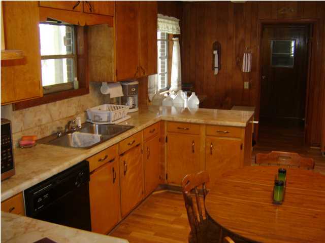 545 Richardson Road DeFuniak Springs, FL 32433 - Photo 10 of 22 a bathroom with a sink and a mirror