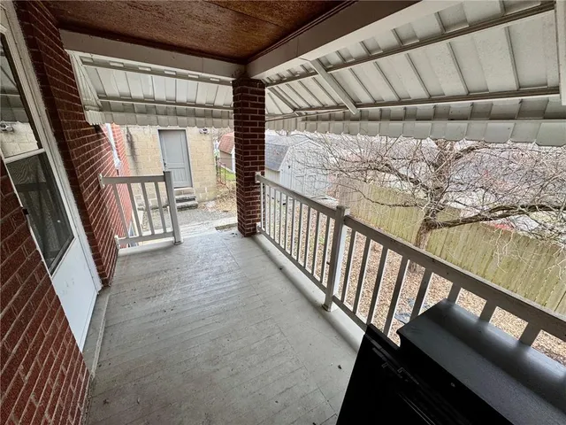 a aerial view of a house with entertaining space