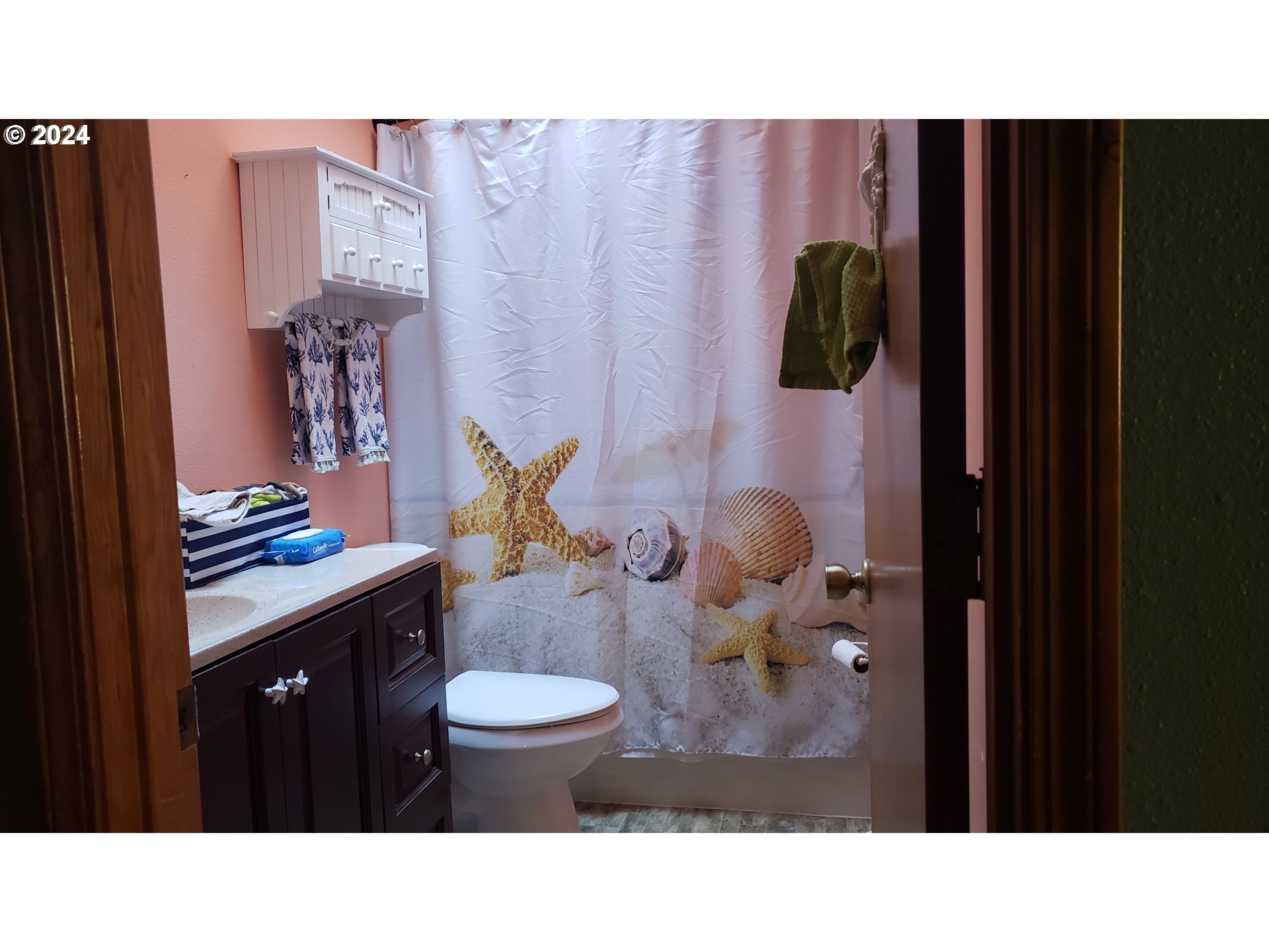 1442 Southwest Wallula Drive Gresham, OR 97080 - Photo 12 of 24 a bathroom with a sink and toilet