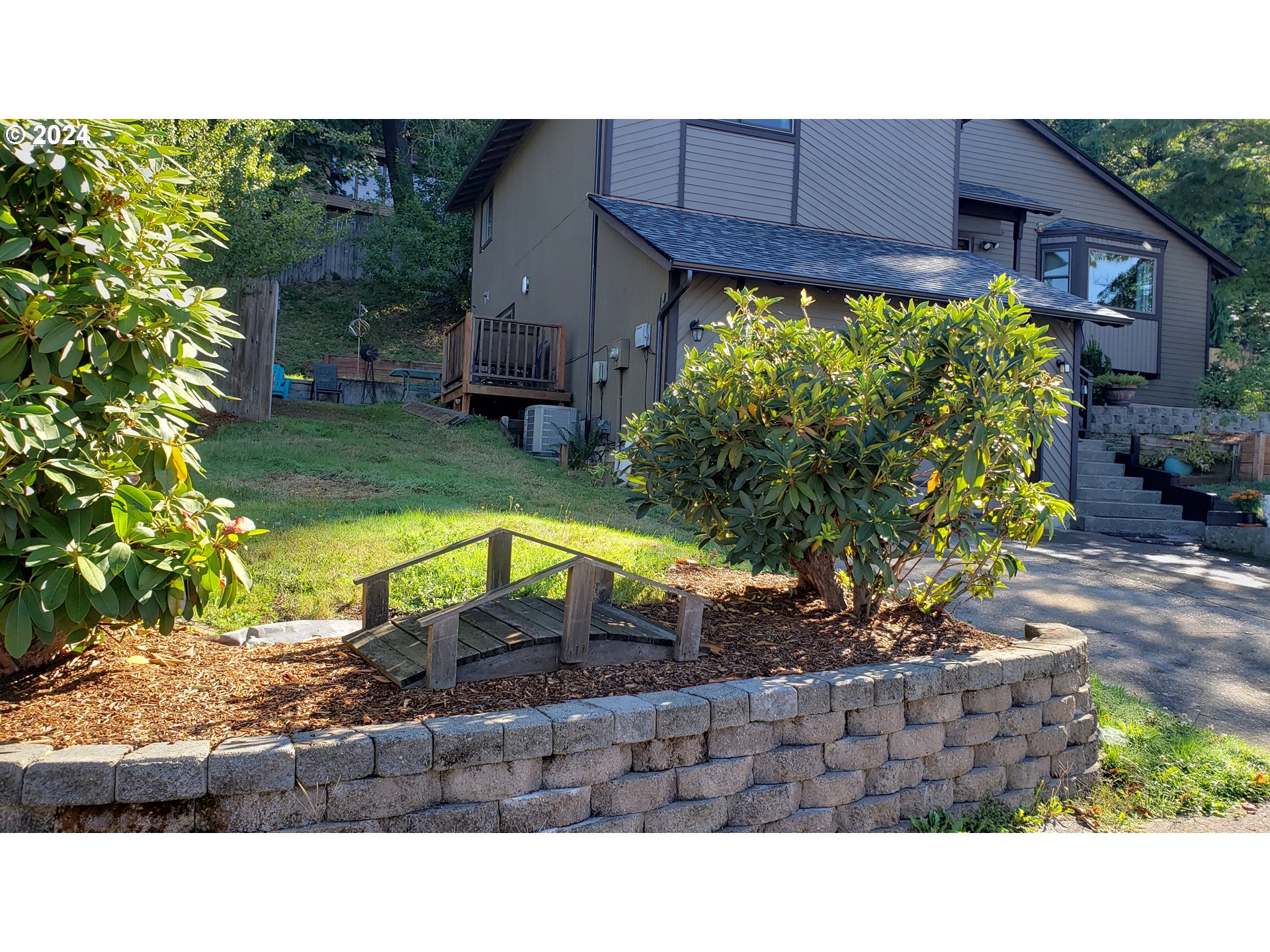 1442 Southwest Wallula Drive Gresham, OR 97080 - Photo 24 of 24 a view of a house with a swimming pool