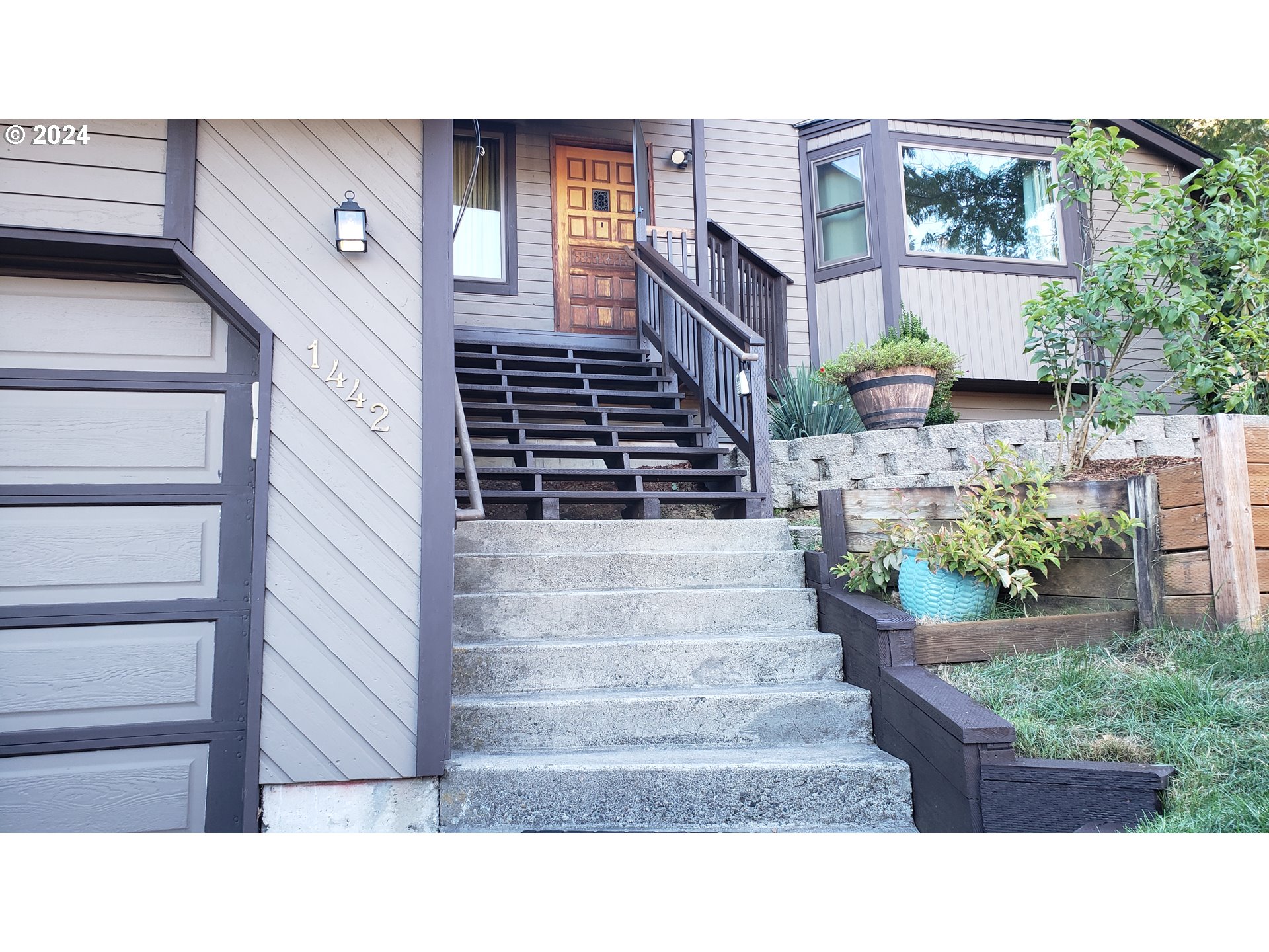 1442 Southwest Wallula Drive Gresham, OR 97080 - Photo 3 of 24 a black and white photo of a house