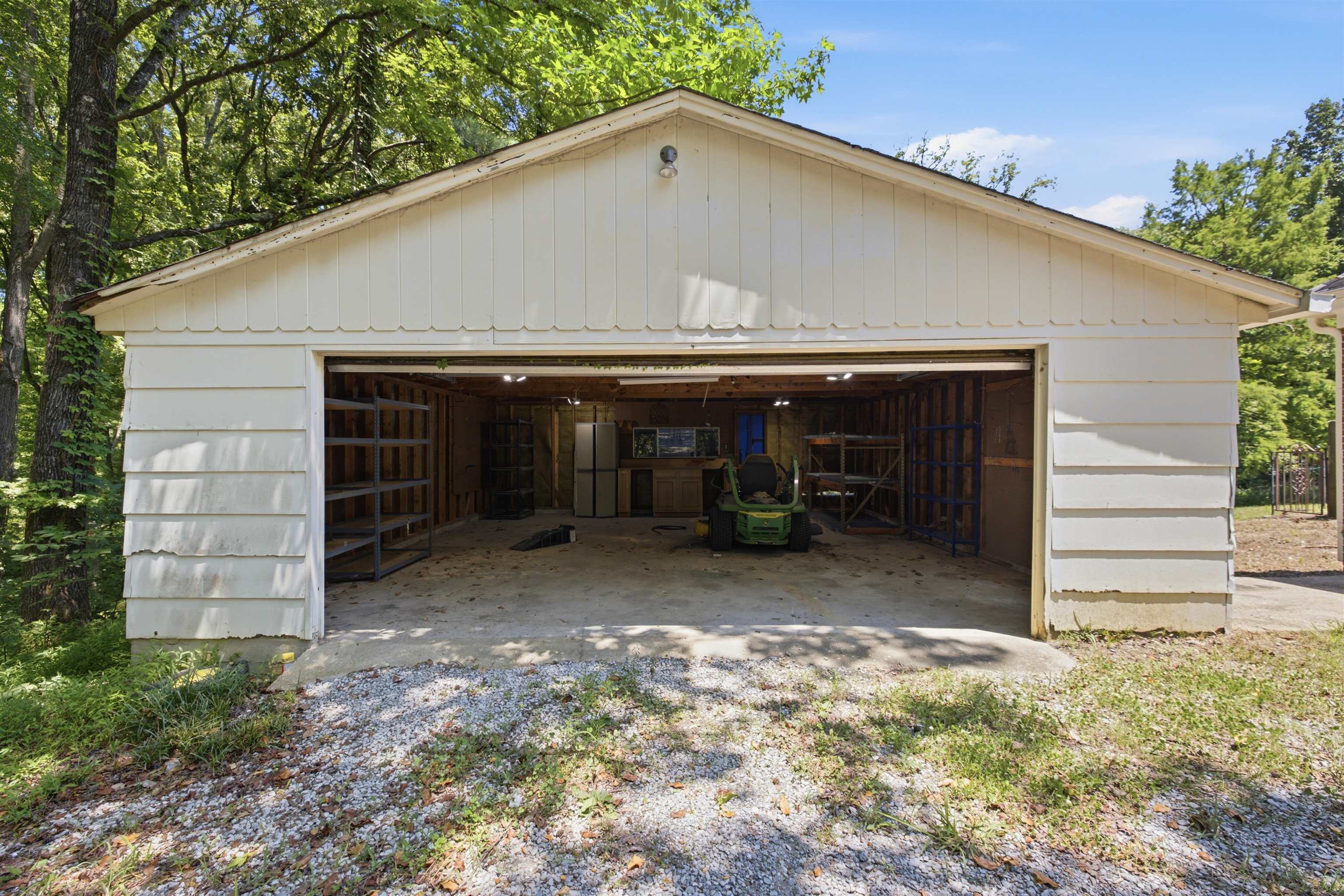 1370 North Reid Hooker Road Eads, TN 38028 - Photo 39 of 39 Detached two-car garage featuring a gabled roofline and horizontal siding