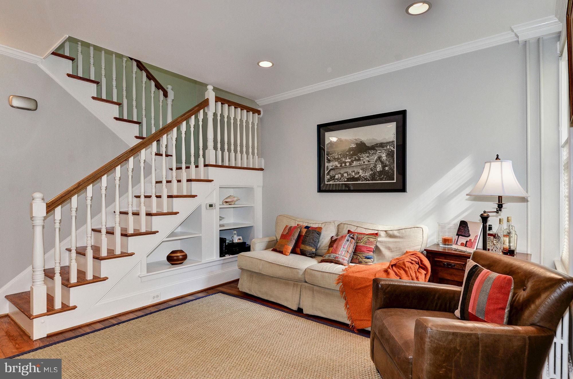 3316 Reservoir Road Northwest Washington, DC 20007 - Photo 2 of 19 a living room with furniture and wooden floor