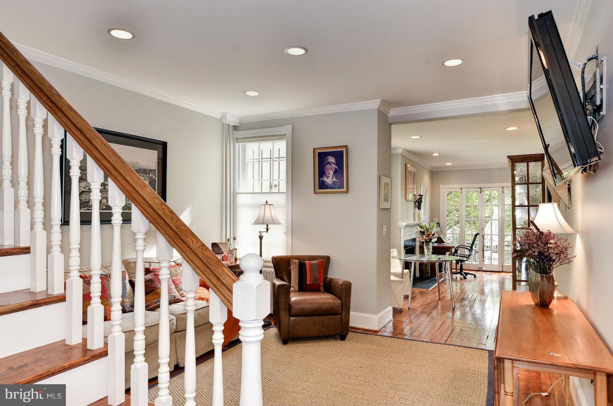 3316 Reservoir Road Northwest Washington, DC 20007 - Photo 5 of 19 a view of living room with furniture and staircase