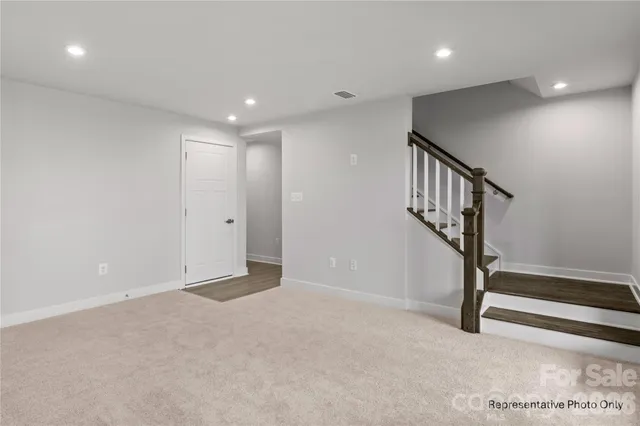 a view of entryway with stairs