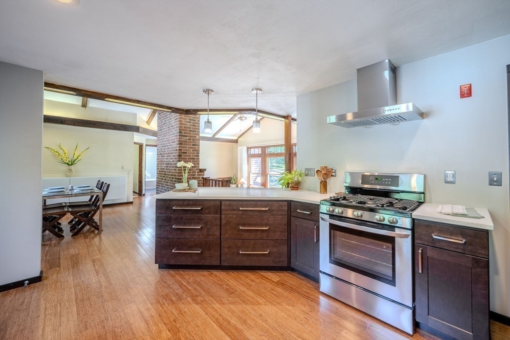 53 Cudworth Road Webster, MA 01570 - Photo 8 of 33 a kitchen with a stove oven and a table