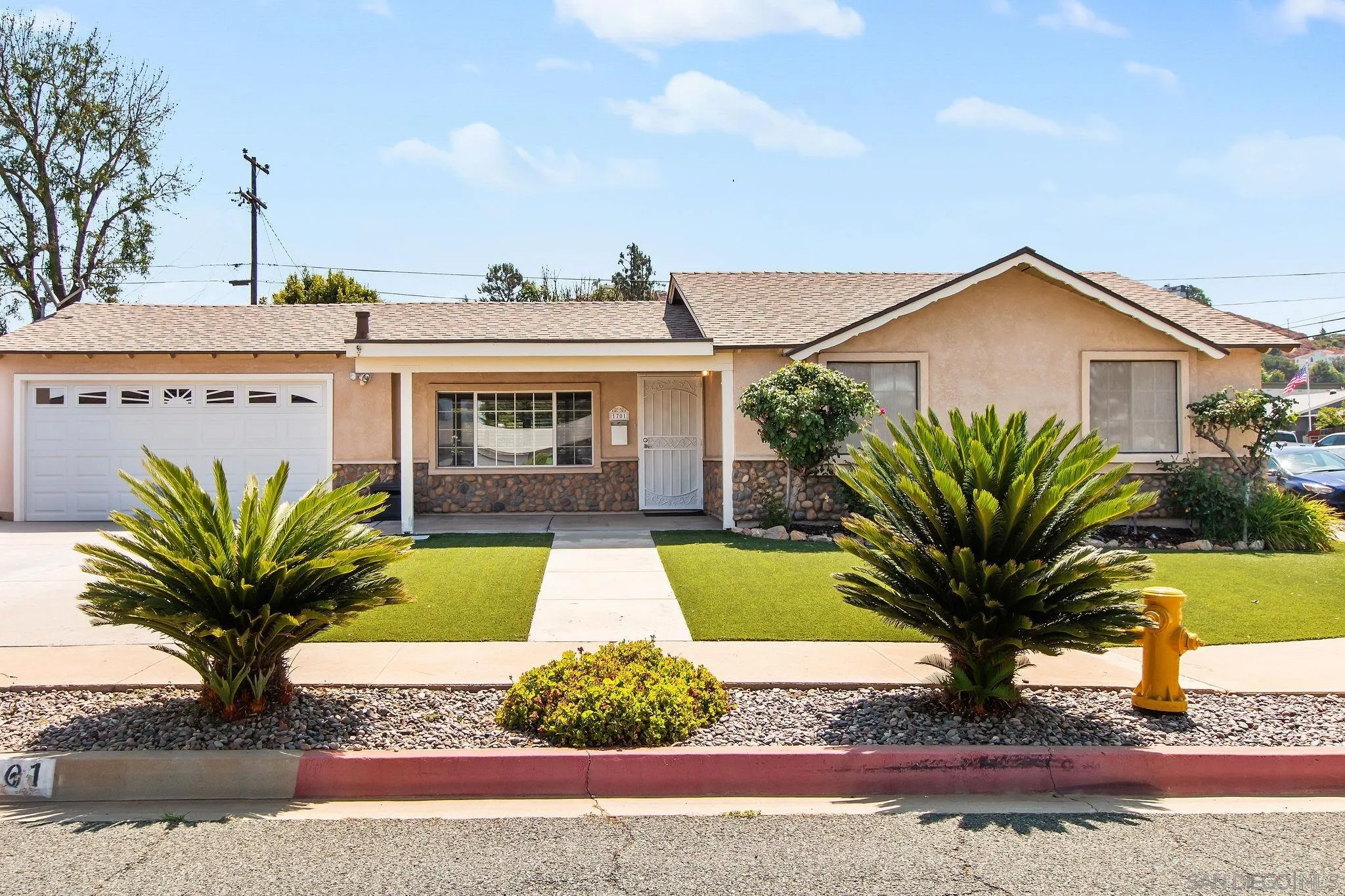 1701 Pepper Villa Drive El Cajon, CA 92021 - Photo 1 of 23 a view of a house with a yard