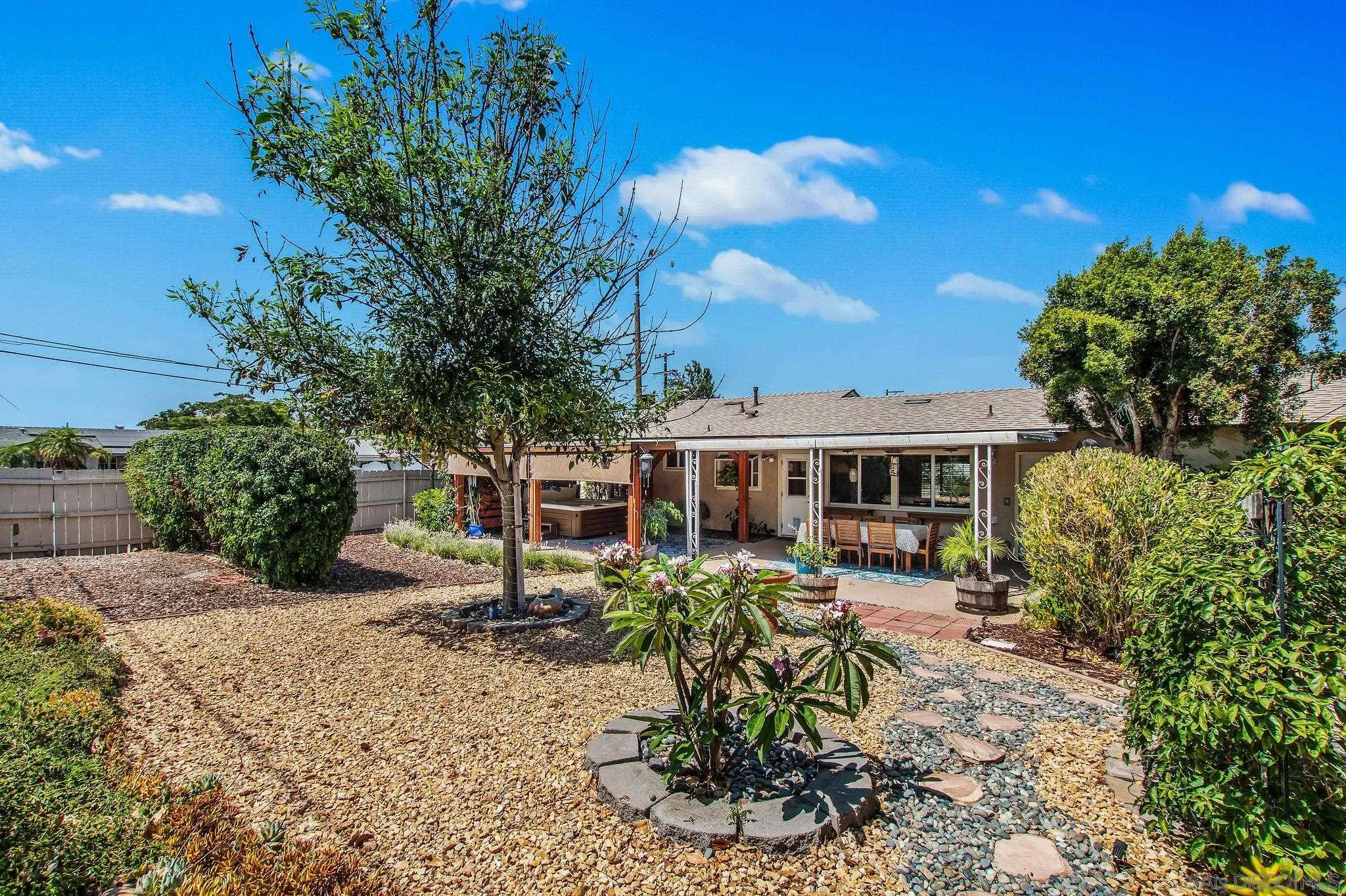1701 Pepper Villa Drive El Cajon, CA 92021 - Photo 11 of 23 a view of a house with backyard and sitting area