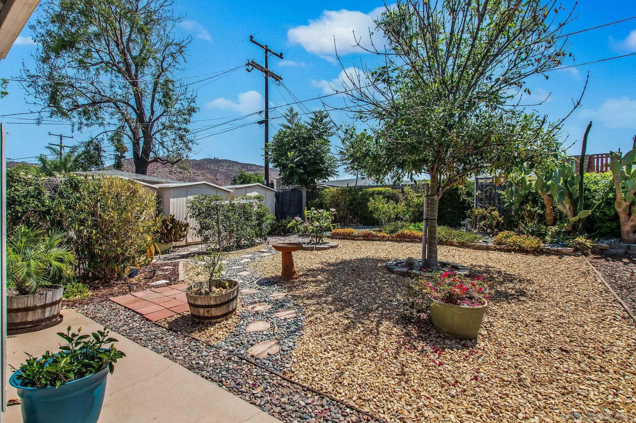 1701 Pepper Villa Drive El Cajon, CA 92021 - Photo 12 of 23 a view of a backyard with sitting area