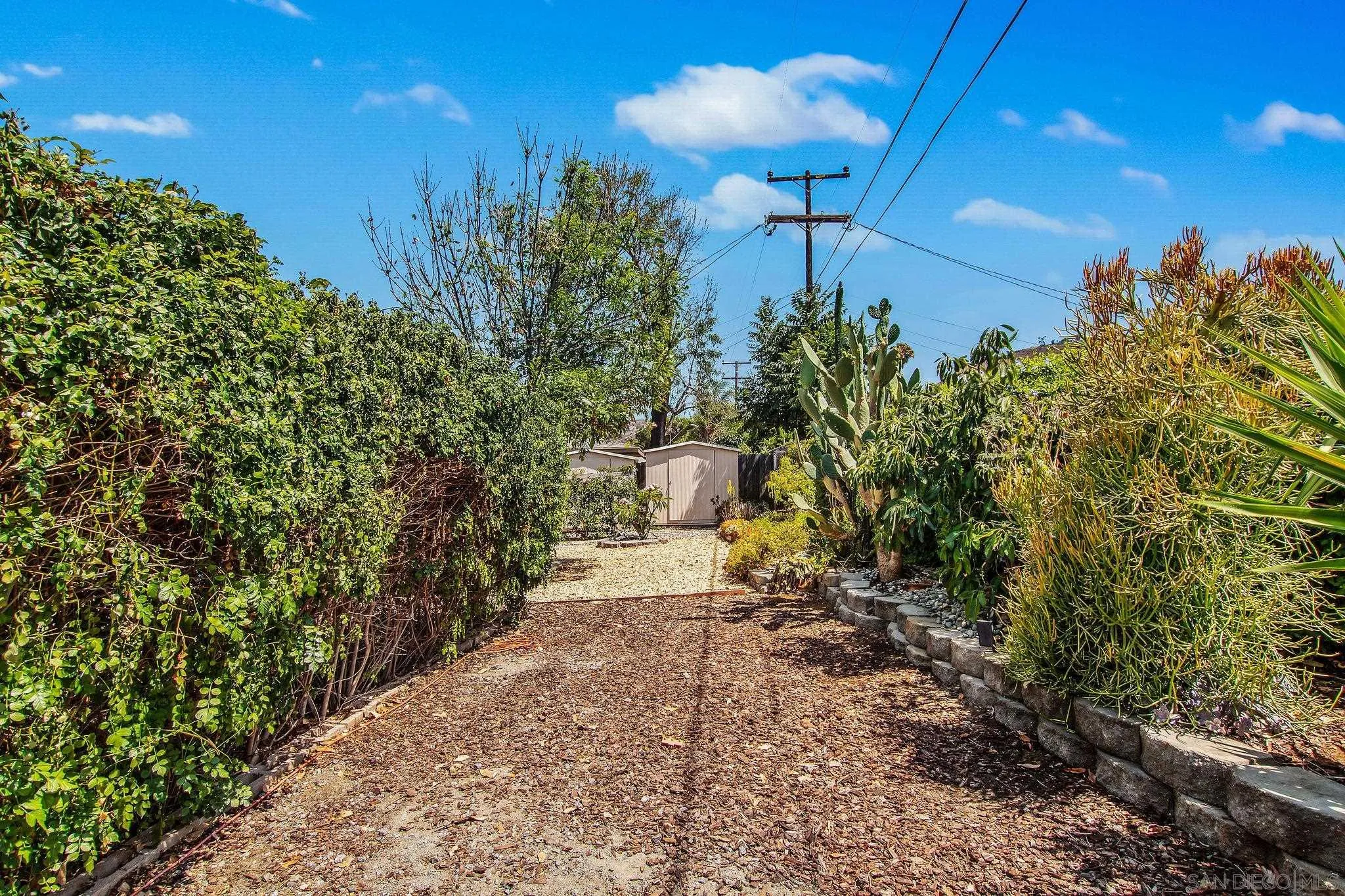 1701 Pepper Villa Drive El Cajon, CA 92021 - Photo 15 of 23 a view of a pathway with a tree