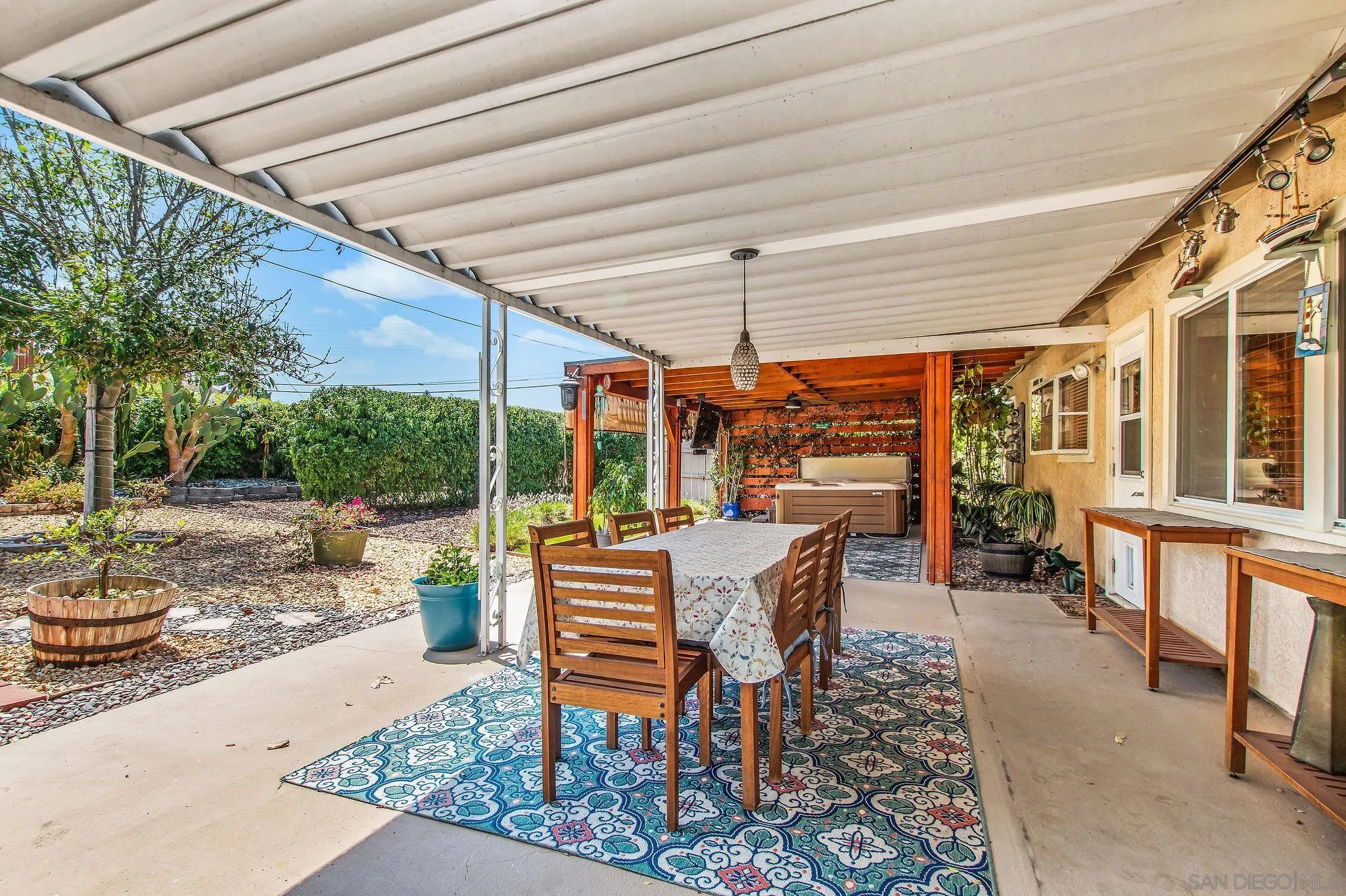 1701 Pepper Villa Drive El Cajon, CA 92021 - Photo 20 of 23 a view of a patio with a dining table and chairs