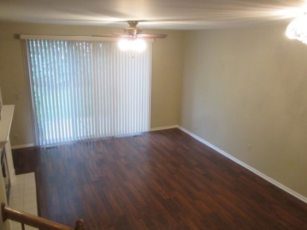17794 Braewick Road Gurnee, IL 60031 - Photo 3 of 18 a view of an empty room with wooden floor