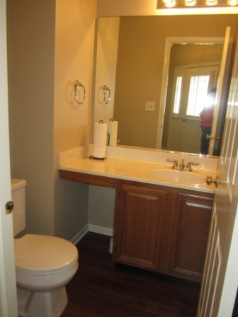 17794 Braewick Road Gurnee, IL 60031 - Photo 8 of 18 a bathroom with a sink and a mirror