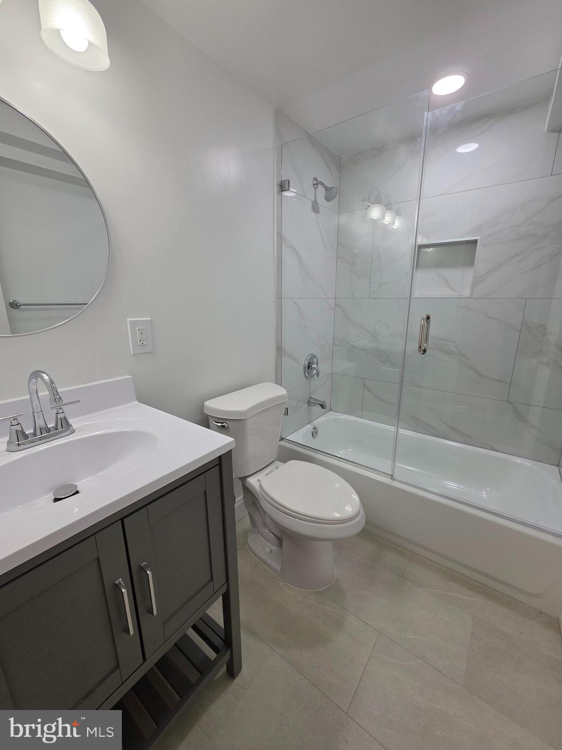 3604 Lakota Road Alexandria, VA 22303 - Photo 17 of 25 a bathroom with a sink a toilet and shower