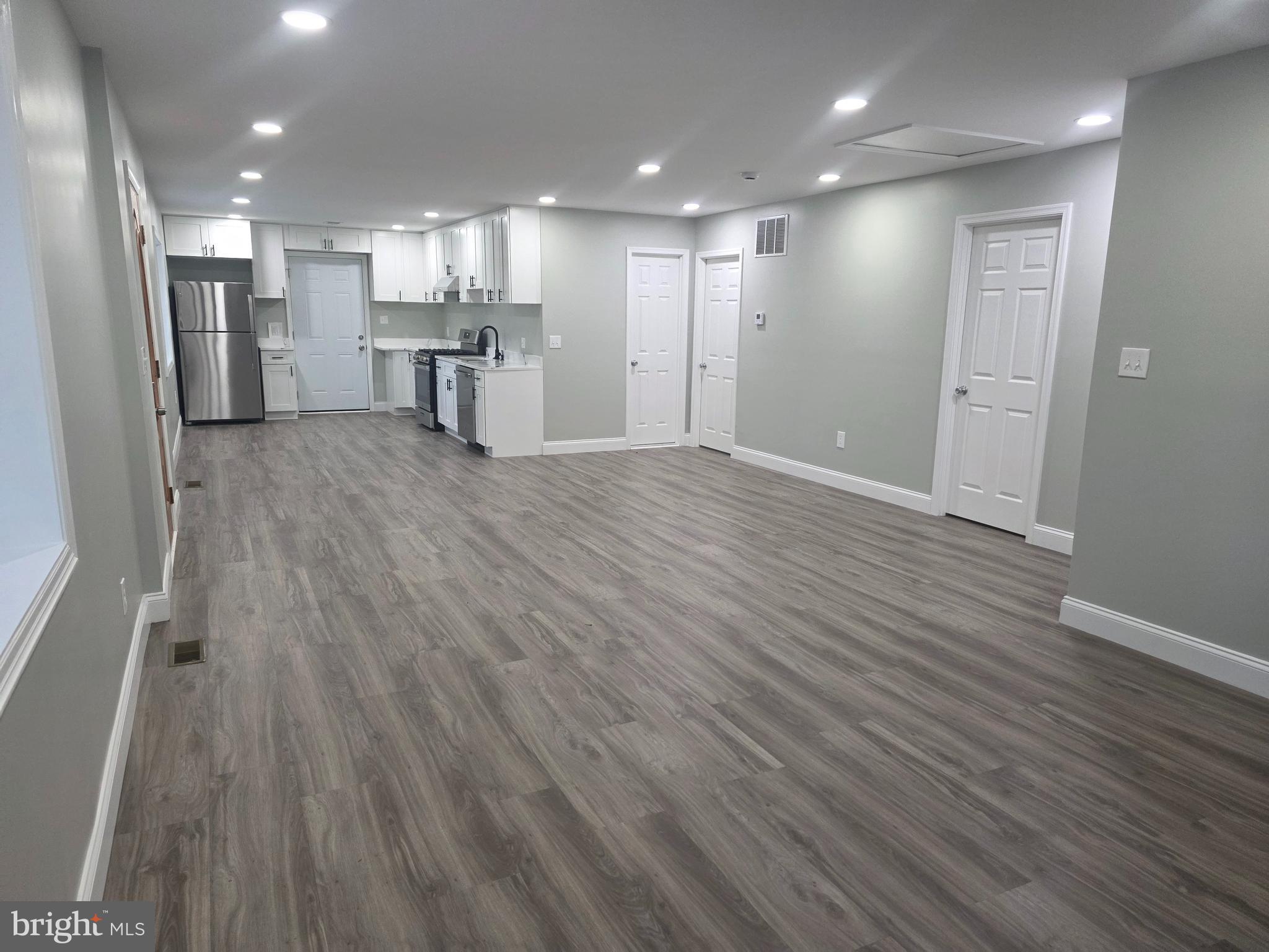 3604 Lakota Road Alexandria, VA 22303 - Photo 3 of 25 a view of a kitchen with a sink and a refrigerator