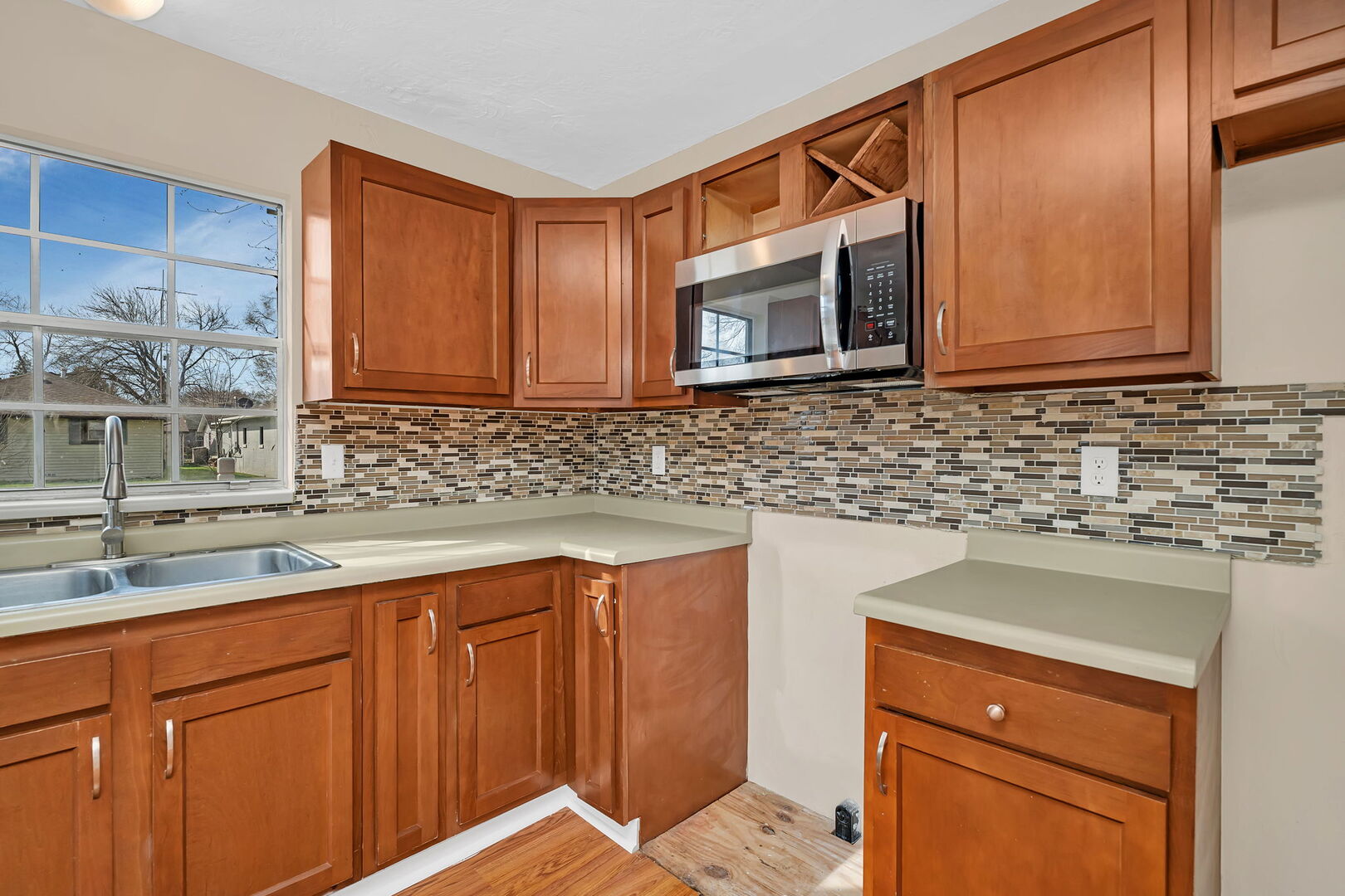 816 2nd Avenue Morris, IL 60450 - Photo 13 of 31 a kitchen with stainless steel appliances granite countertop a sink stove and cabinets