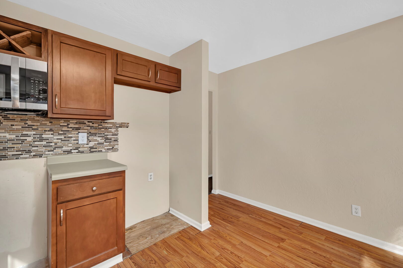816 2nd Avenue Morris, IL 60450 - Photo 14 of 31 a kitchen with granite countertop cabinets stainless steel appliances a sink and wooden floor