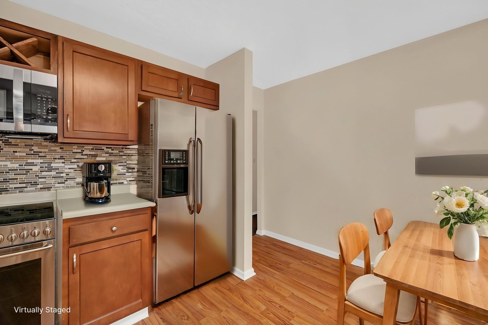 816 2nd Avenue Morris, IL 60450 - Photo 15 of 31 a kitchen with stainless steel appliances granite countertop a refrigerator a stove a sink cabinets and wooden floor