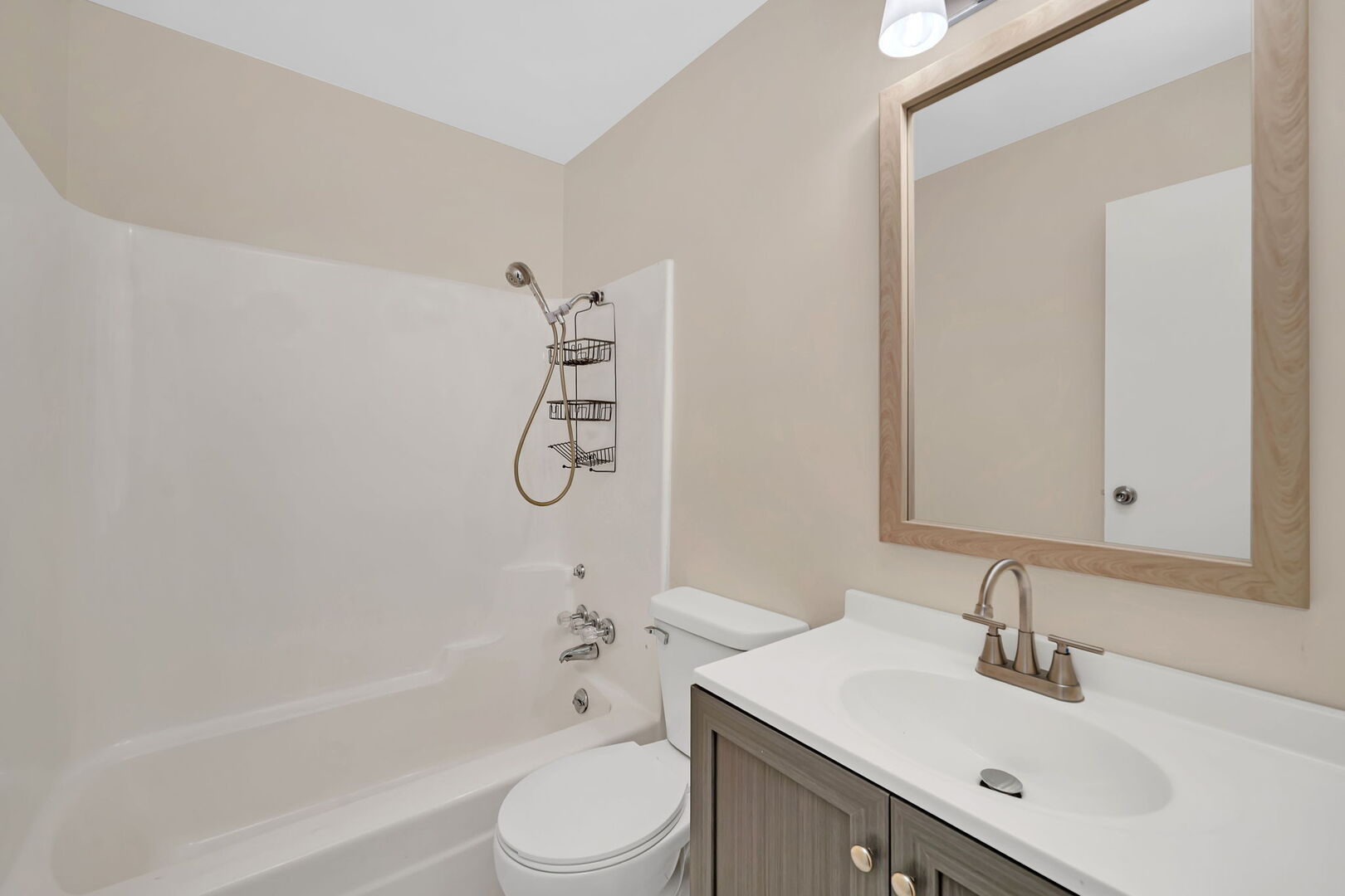816 2nd Avenue Morris, IL 60450 - Photo 22 of 31 a bathroom with a sink toilet vanity and shower