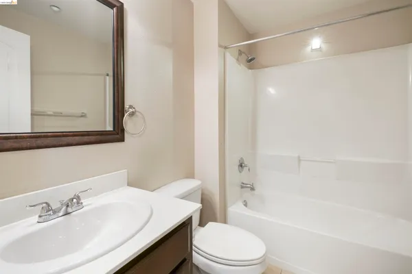 a bathroom with a toilet a sink and a bathtub