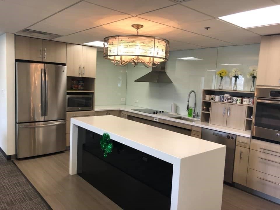 2 Victory Road, Unit 38 Lynn, MA 01902 - Photo 10 of 10 a kitchen with a refrigerator a sink and a stove top oven