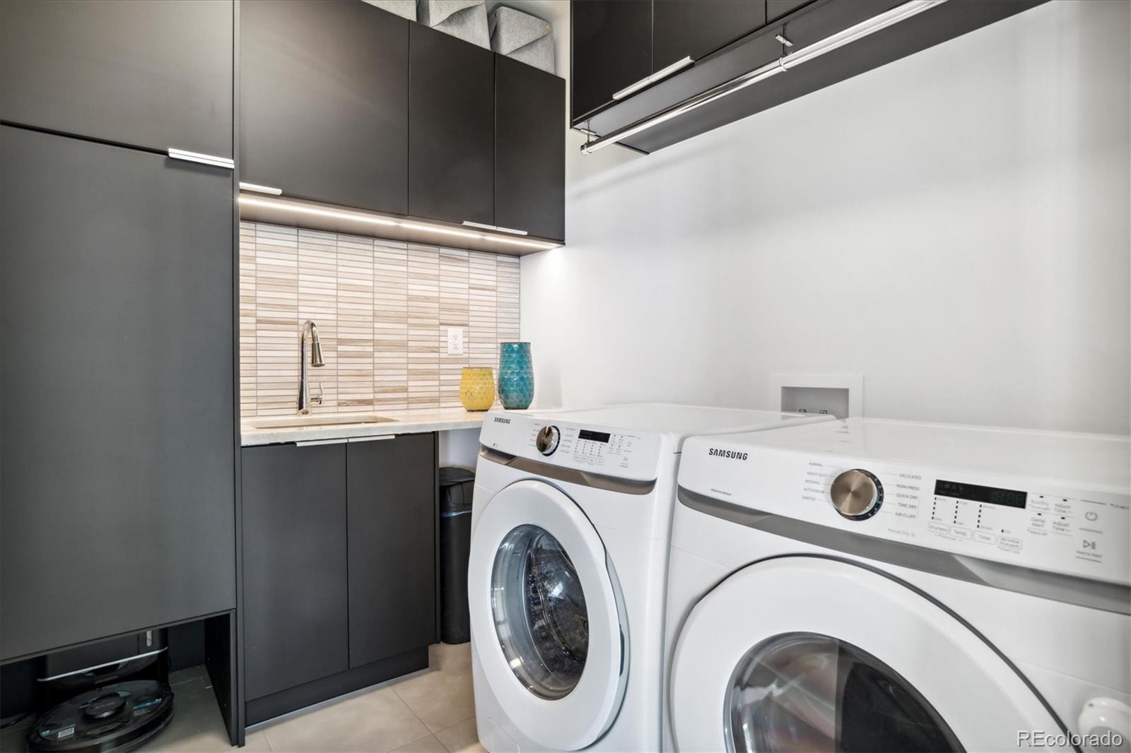 10199 Christopher Drive Conifer, CO 80433 - Photo 24 of 40 a utility room with dryer and washer