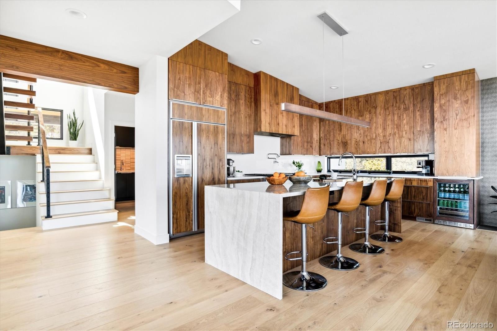 10199 Christopher Drive Conifer, CO 80433 - Photo 5 of 40 a dining room filled with furniture and a table