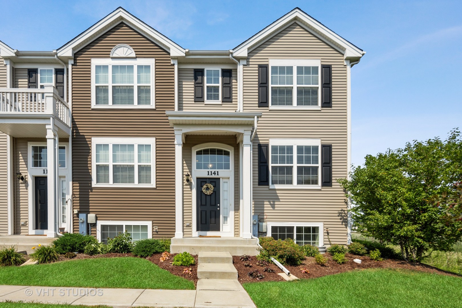 1141 Piccolo Lane Volo, IL 60073 - Photo 2 of 29 a front view of a house with garden