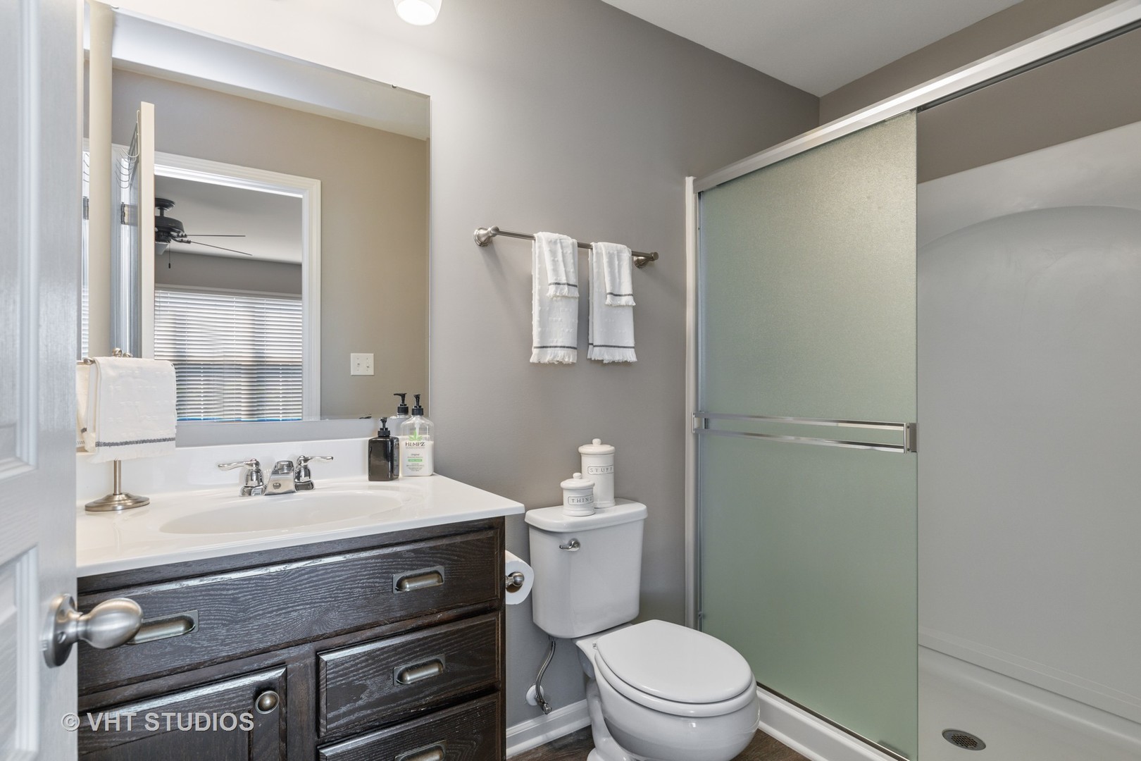1141 Piccolo Lane Volo, IL 60073 - Photo 12 of 29 a bathroom with a sink a toilet and shower
