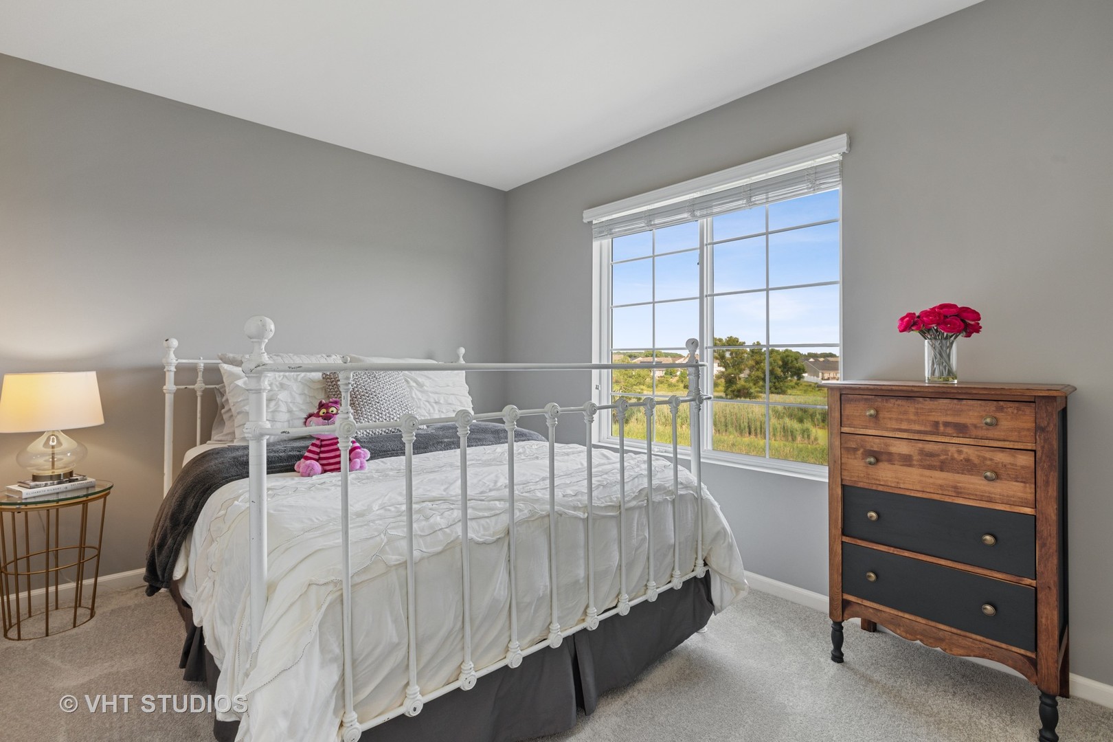 1141 Piccolo Lane Volo, IL 60073 - Photo 13 of 29 a bedroom with a bed and a window
