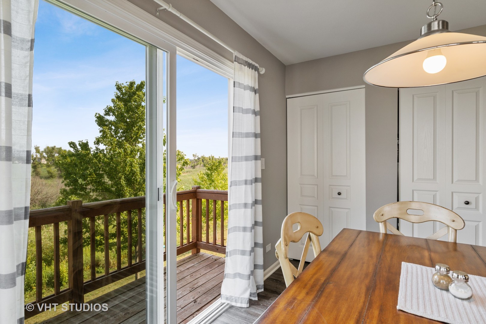 1141 Piccolo Lane Volo, IL 60073 - Photo 19 of 29 a view of a balcony with table and chairs